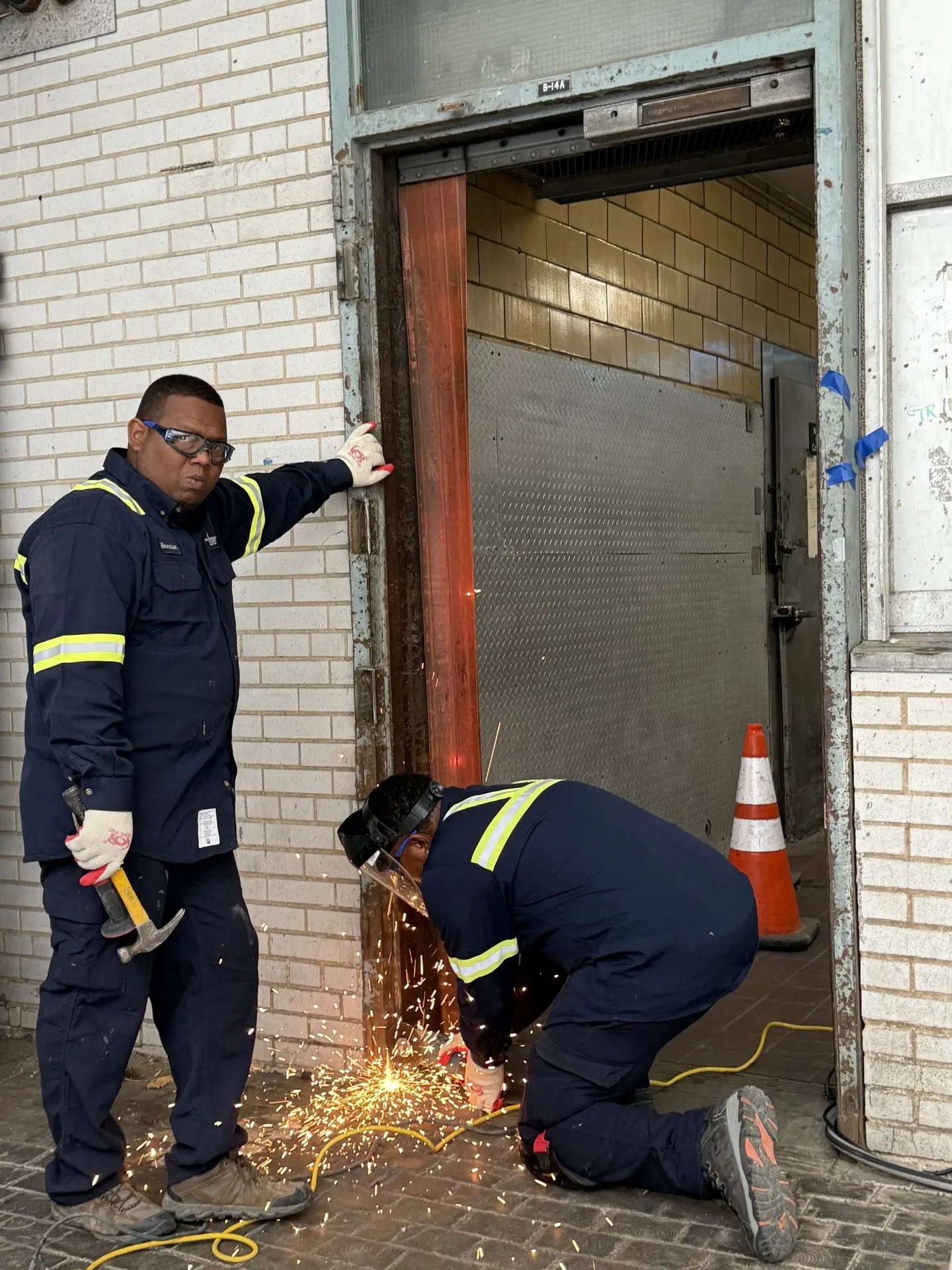 Fire-rated door inspection verifying self-closing mechanism and positive latching